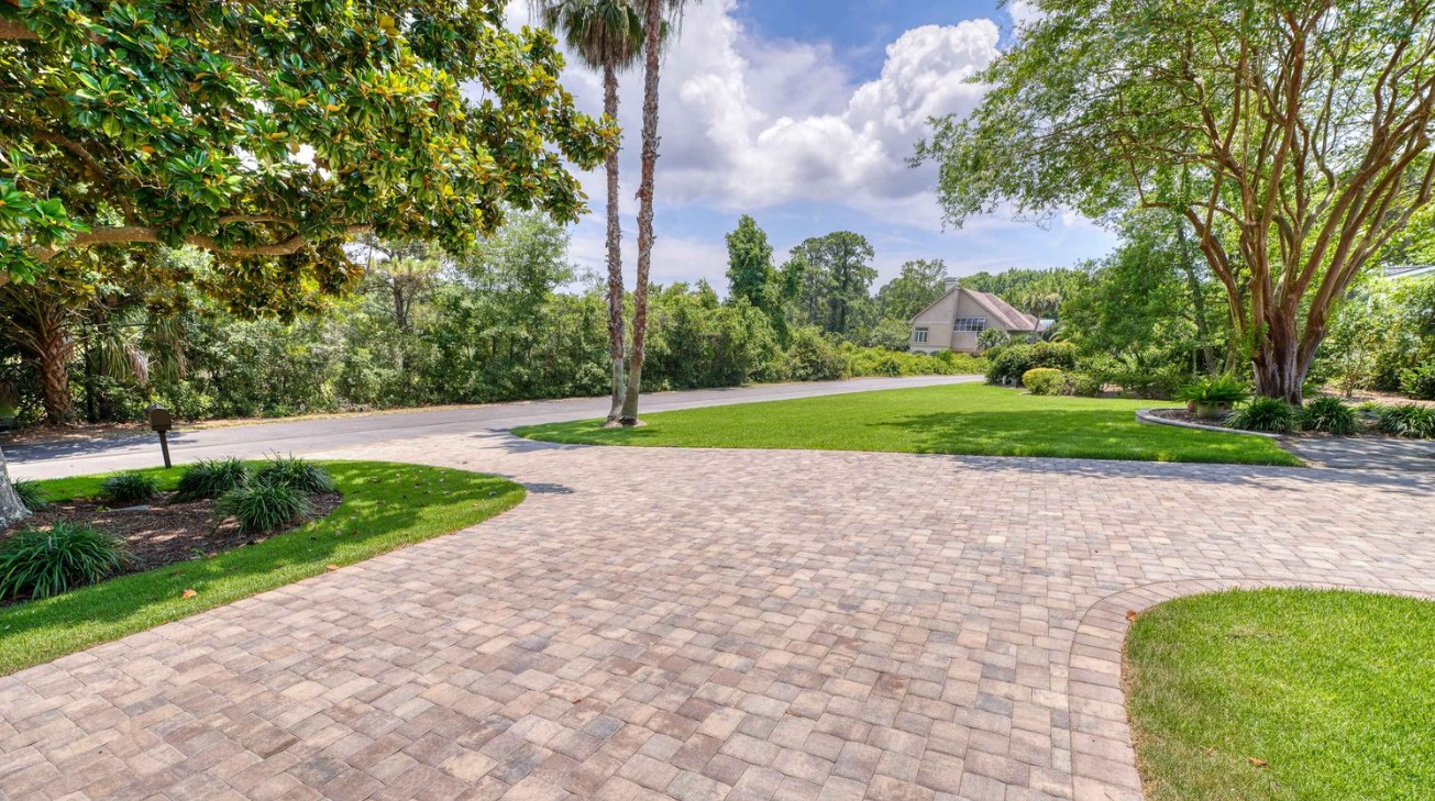 Large estate driveway with curved paver design